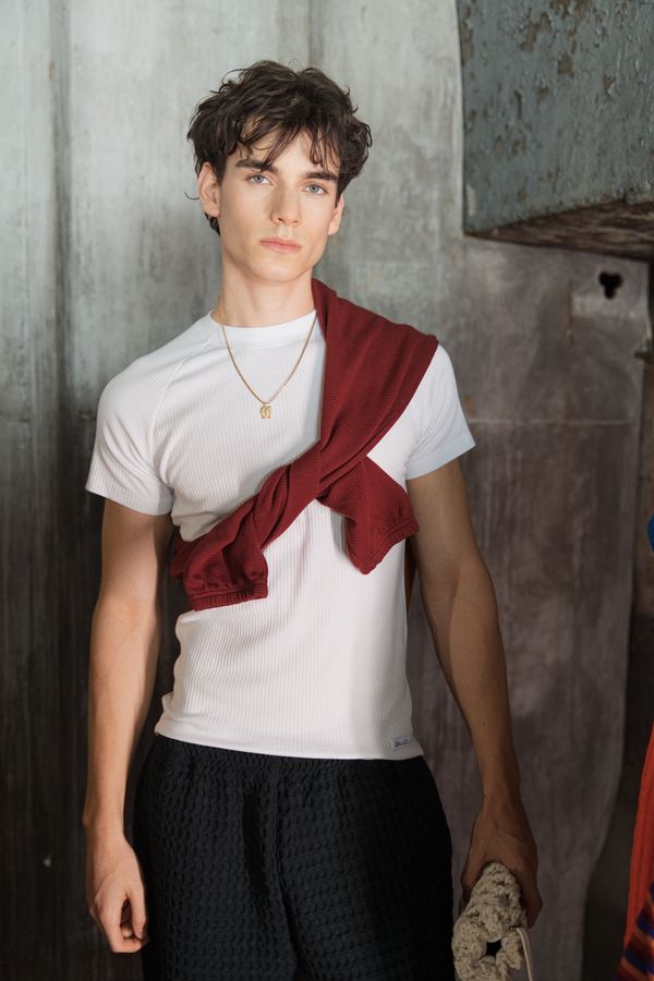 Jan — backstage look, white tee and red knit
