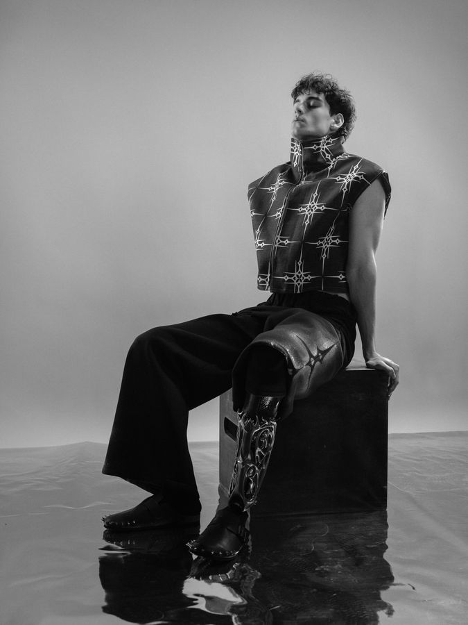 Jan — studio, black and white, printed vest